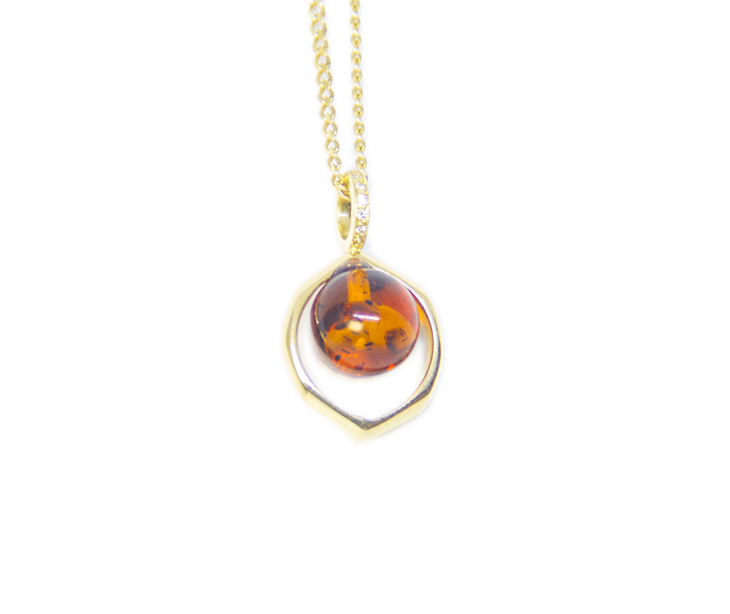 Ball Amber with gold and diamond